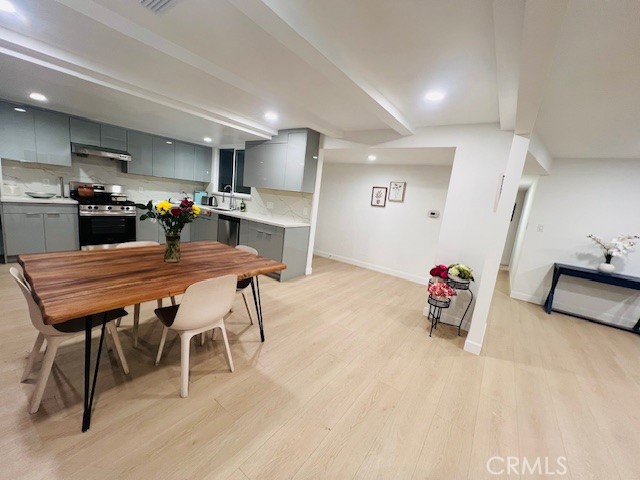 1135 Lockhaven Drive Brea, CA 92821 - Photo 8 of 35 a dining room with furniture and a livingroom