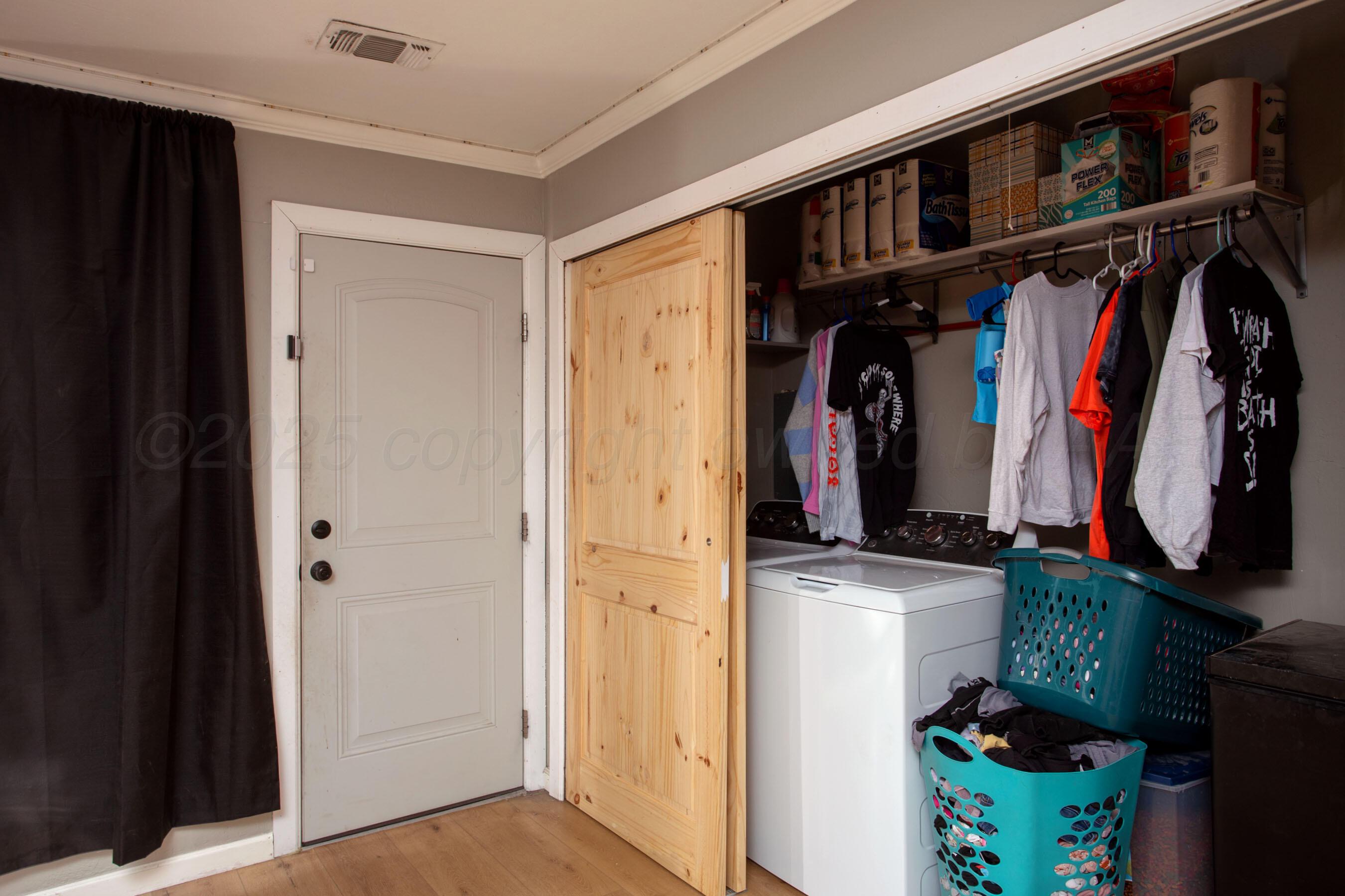 4409 South Lipscomb Street Amarillo, TX 79110 - Photo 13 of 23 a view of walk in closet with clothes and shoes