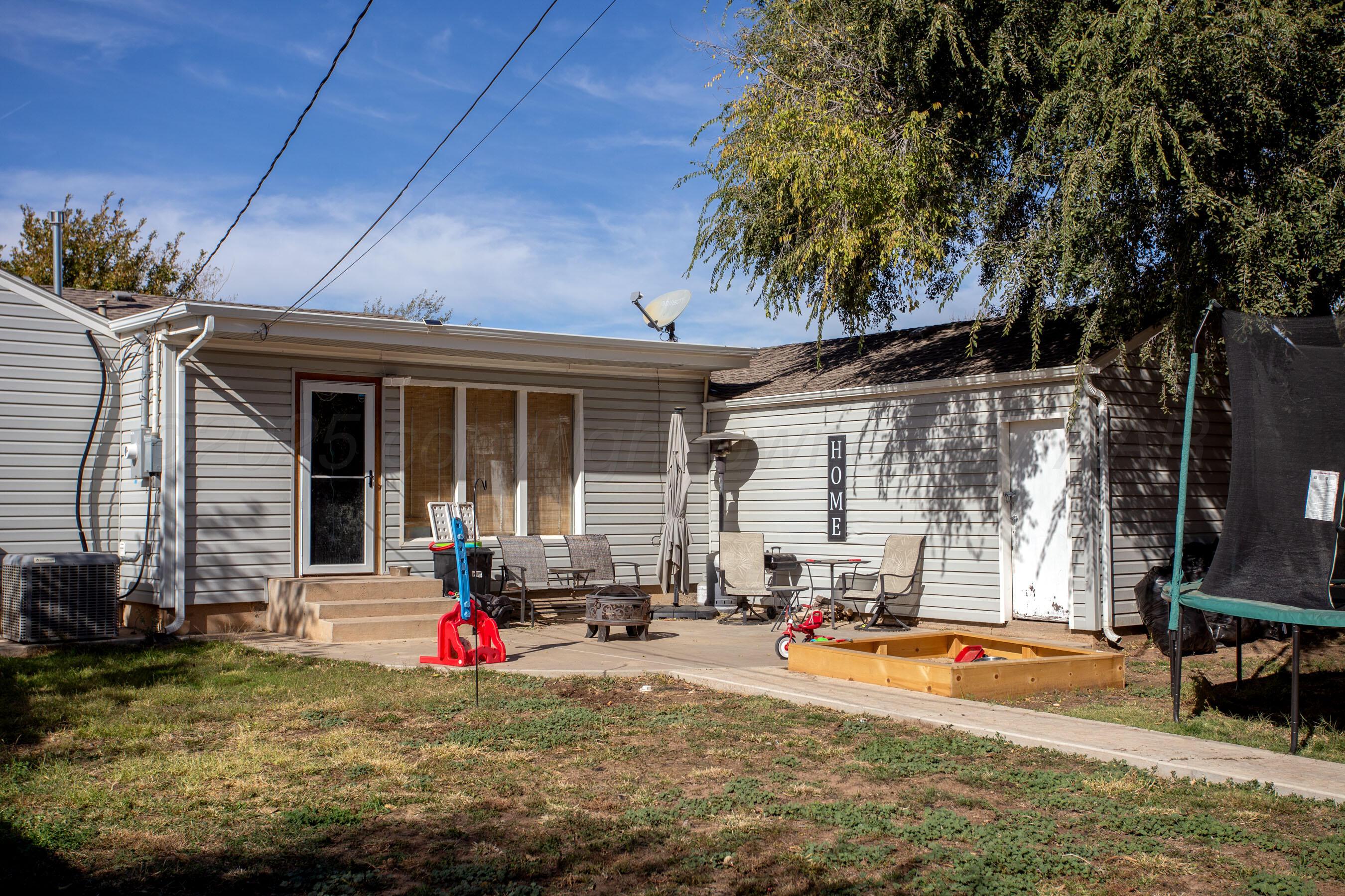 4409 South Lipscomb Street Amarillo, TX 79110 - Photo 22 of 23 a view of a house with backyard and sitting area
