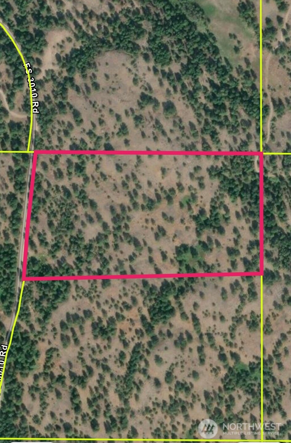 0 Fs 3010 Road Tonasket, WA 98855 - Photo 2 of 3 a view of a flower arrangement in front of a house