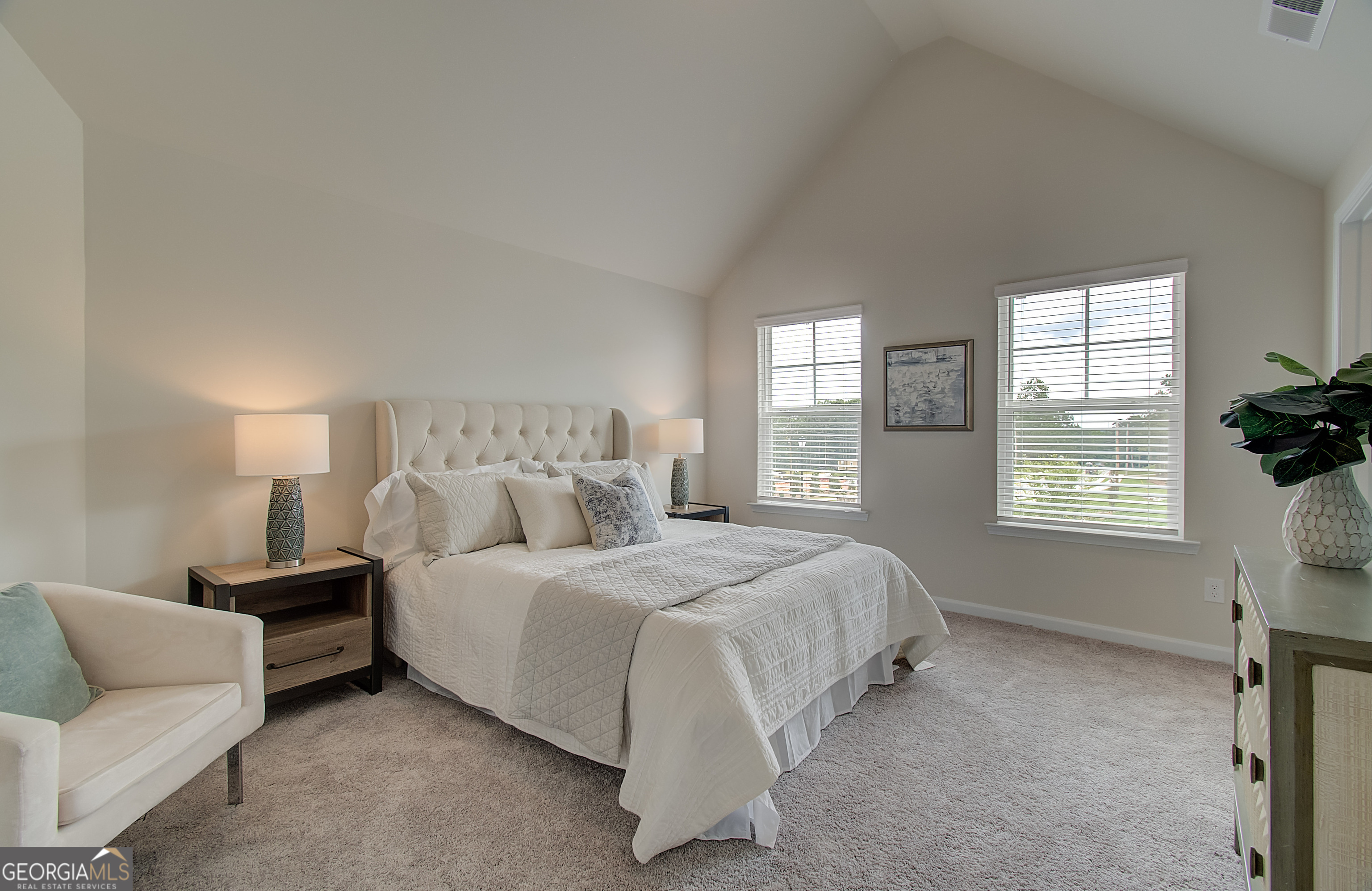 477 Collier Mls Road, Unit 20 Lawrenceville, GA 30045 - Photo 20 of 36 a bedroom with a bed and a window