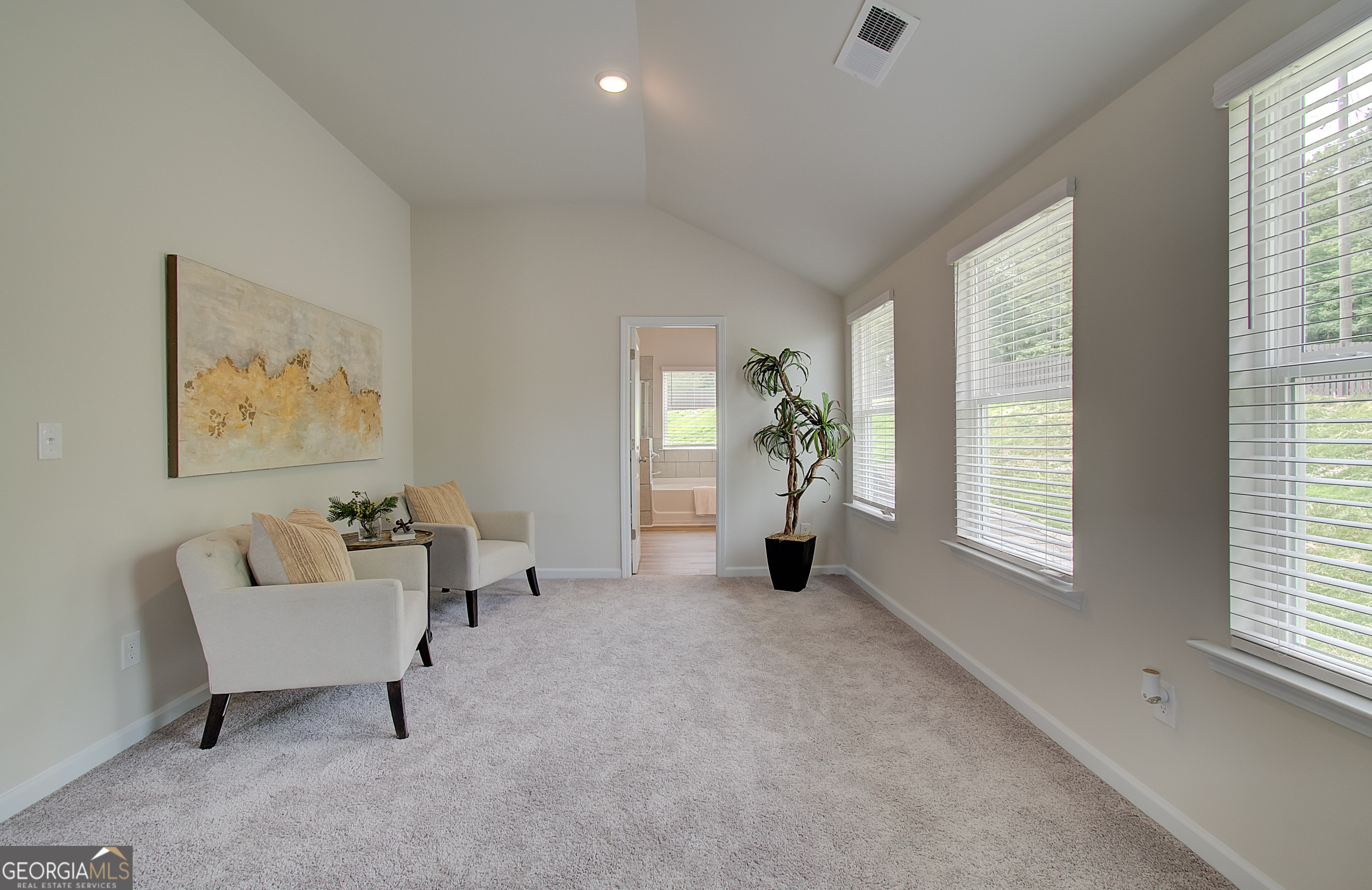 477 Collier Mls Road, Unit 20 Lawrenceville, GA 30045 - Photo 30 of 36 a living room with furniture and a window