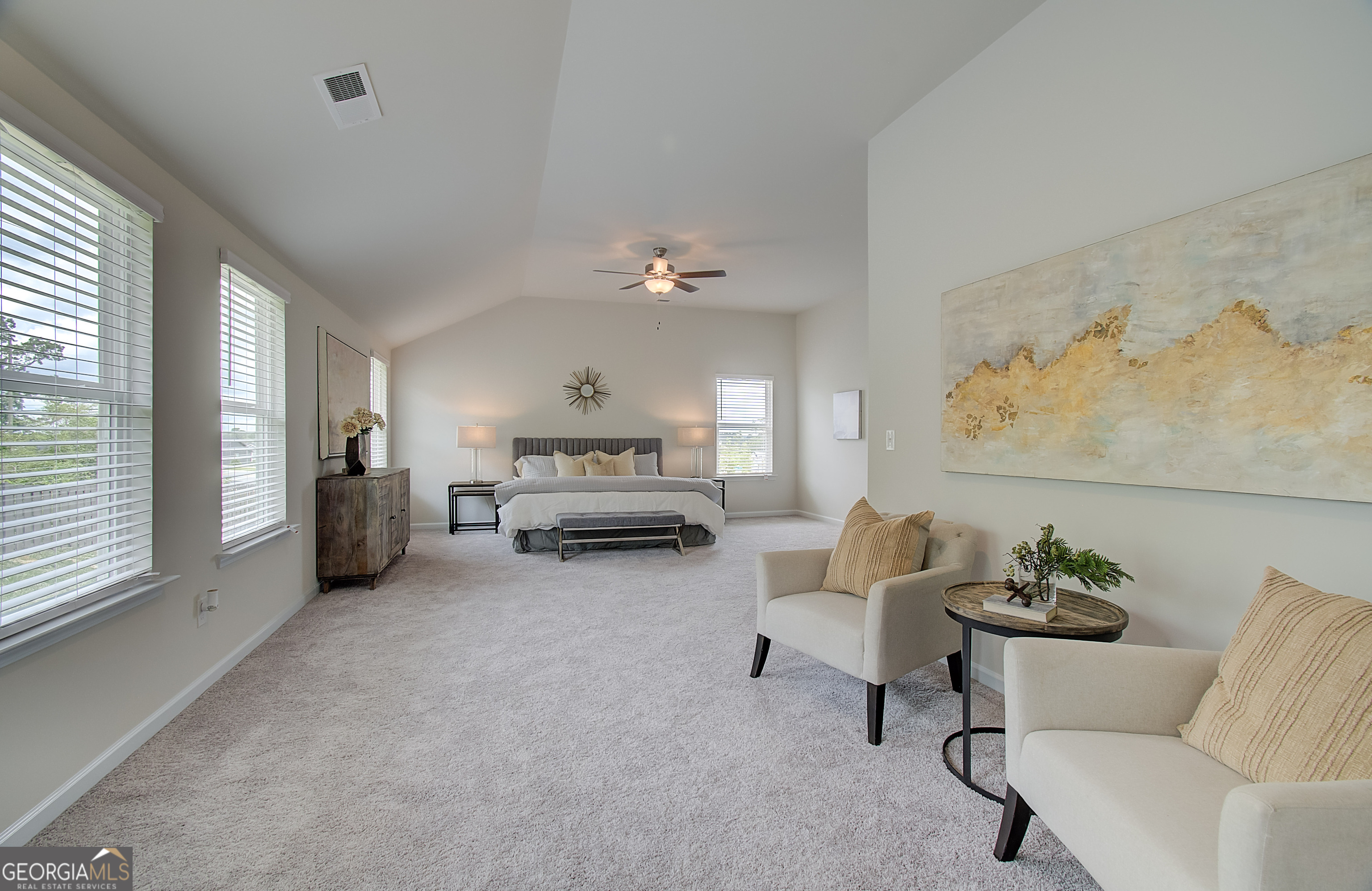 477 Collier Mls Road, Unit 20 Lawrenceville, GA 30045 - Photo 31 of 36 a living room with furniture and a chandelier