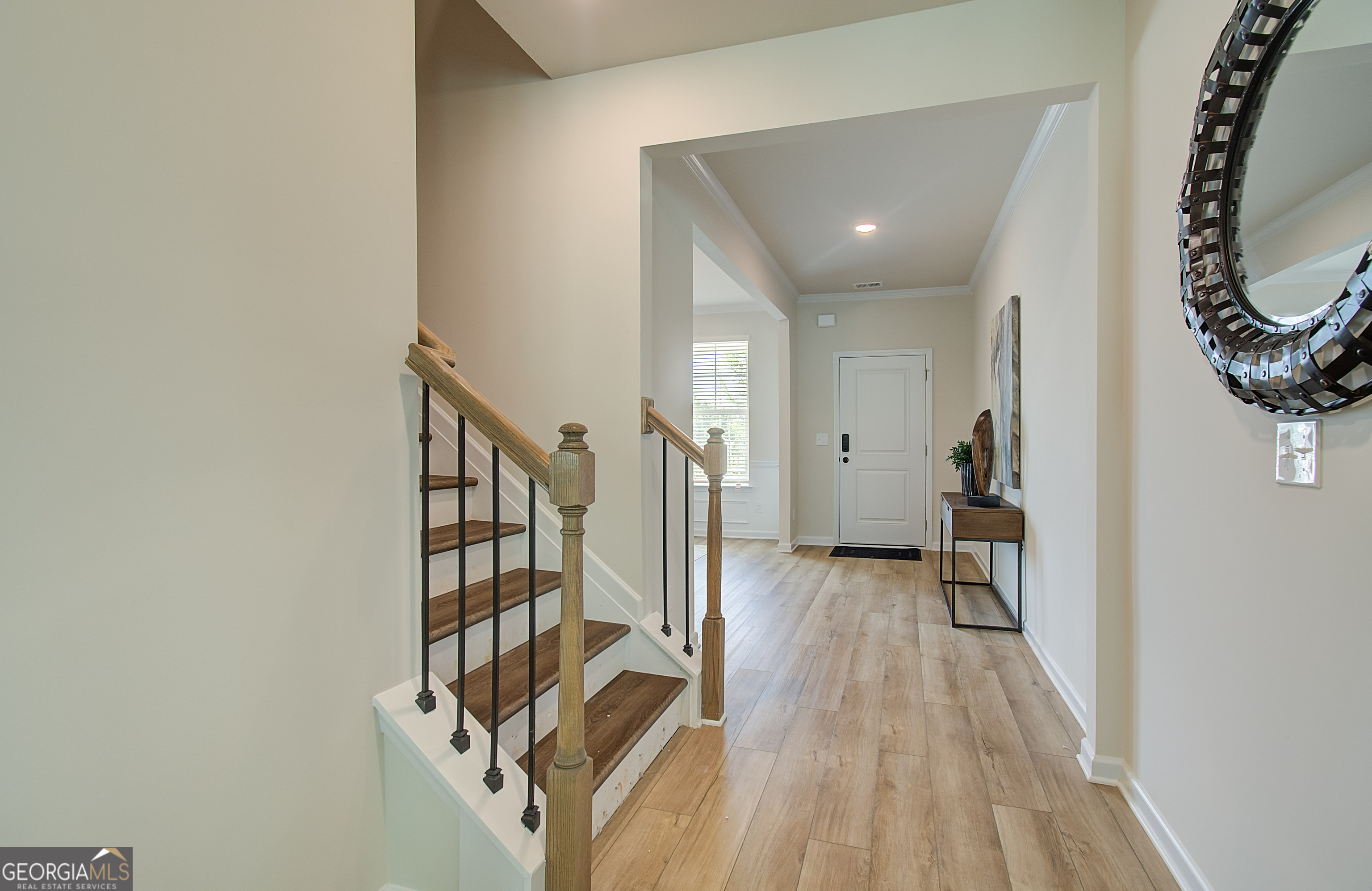 477 Collier Mls Road, Unit 20 Lawrenceville, GA 30045 - Photo 5 of 36 a view of entryway with wooden floor