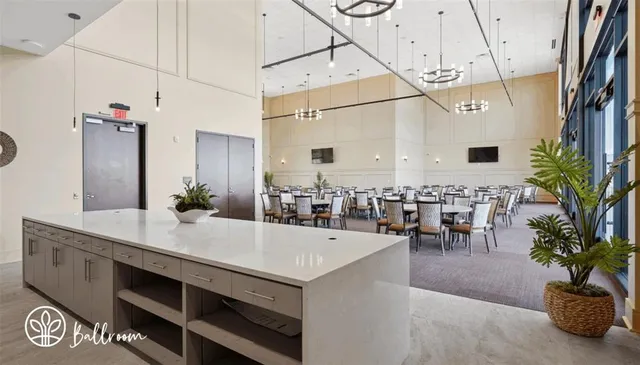 an aerial view of a house with outdoor space and lake view