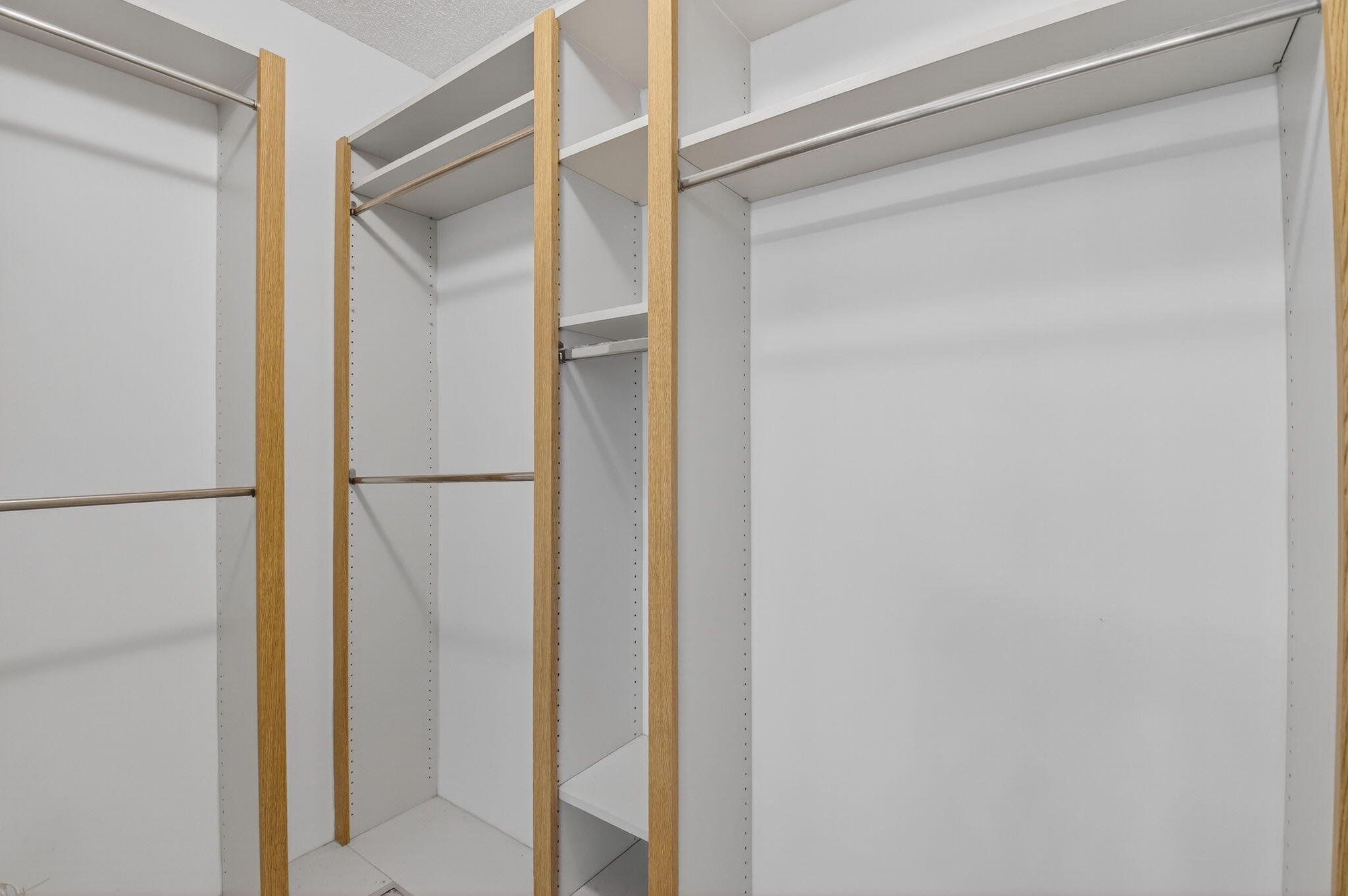 6193 Balboa Circle, Unit 403 Boca Raton, FL 33433 - Photo 13 of 25 a bathroom with a glass shower door