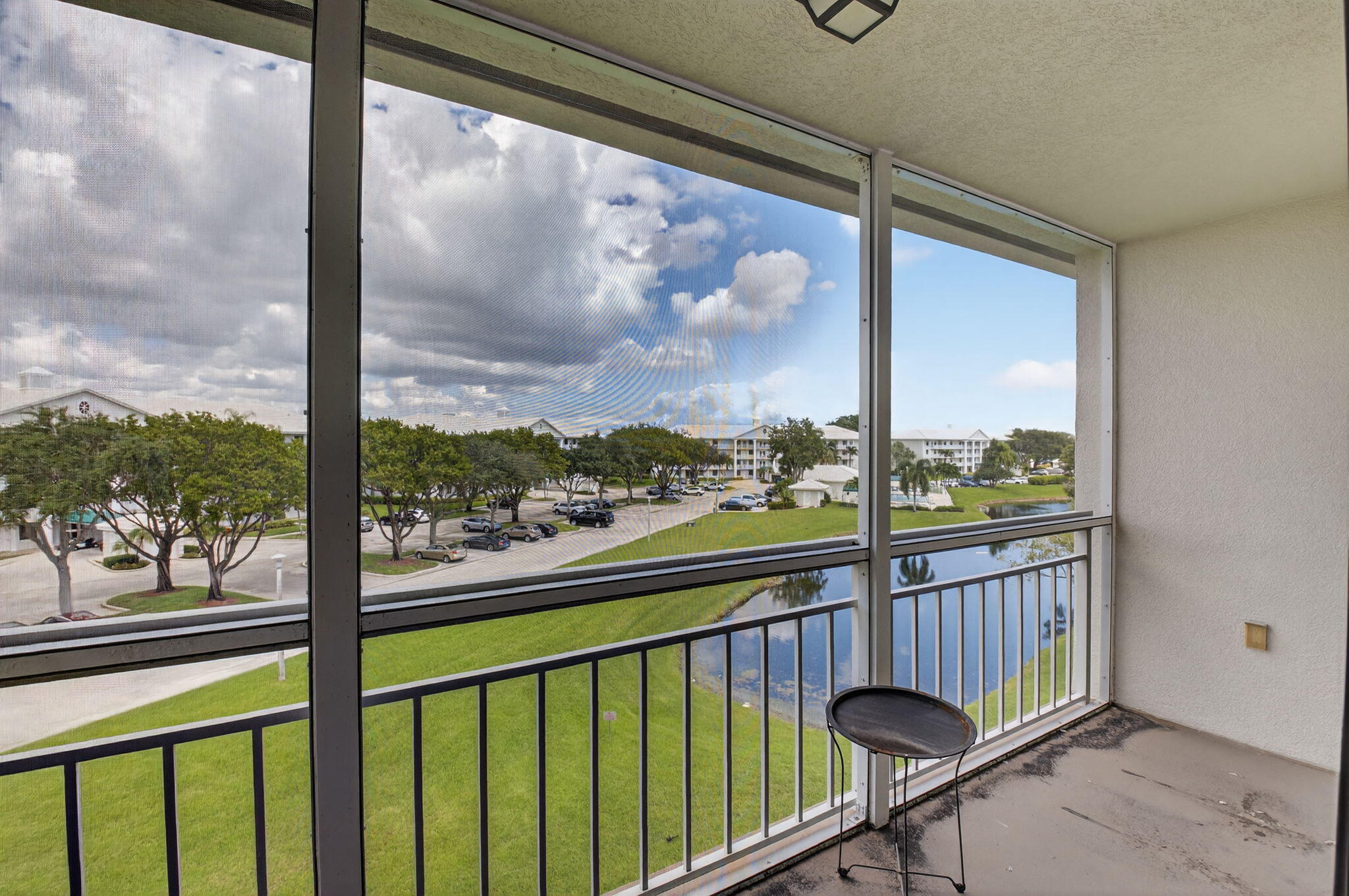 6193 Balboa Circle, Unit 403 Boca Raton, FL 33433 - Photo 18 of 25 a view of a city view from a balcony