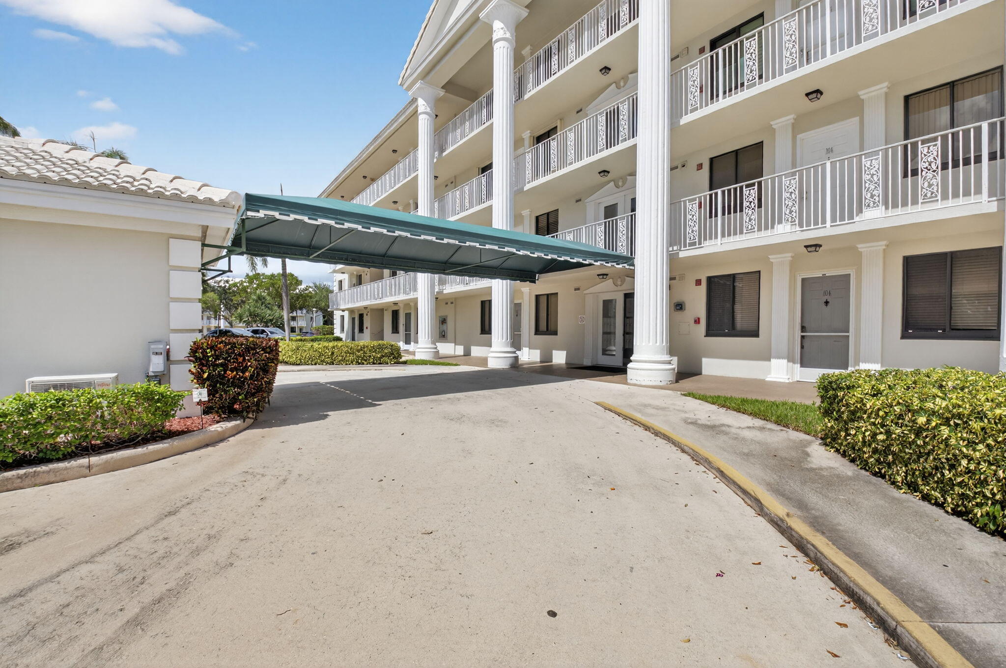 6193 Balboa Circle, Unit 403 Boca Raton, FL 33433 - Photo 3 of 25 a house view with a outdoor space