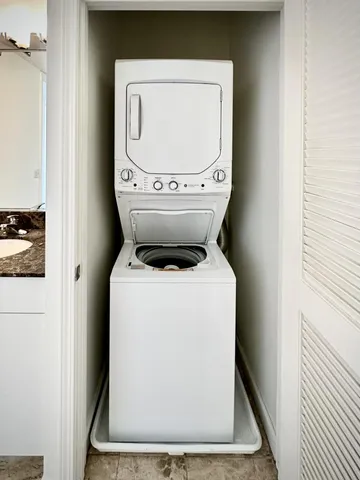 a utility room with dryer and washer