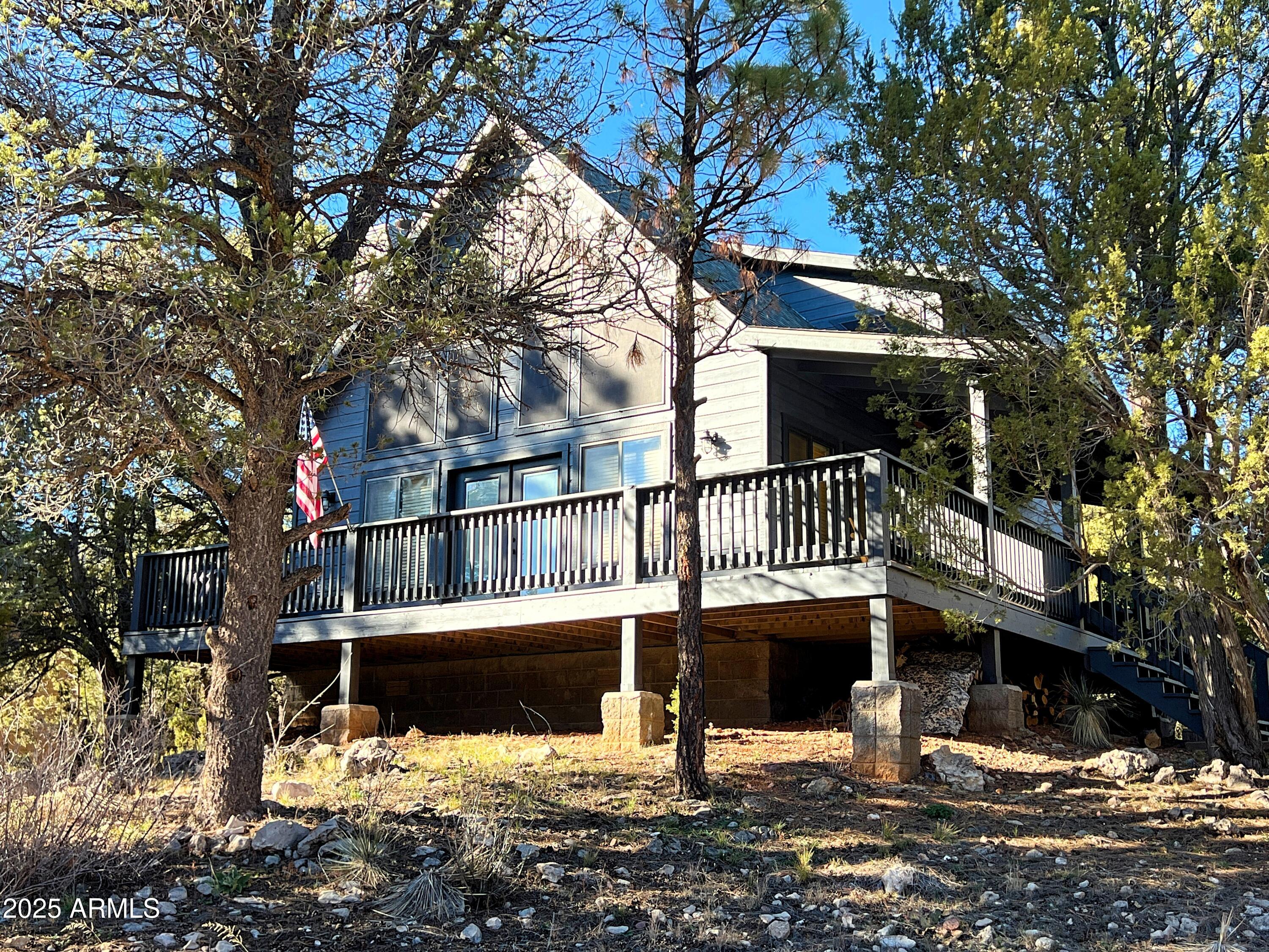 2240 Fairway Drive Overgaard, AZ 85933 - Photo 2 of 51 front view of house with a yard