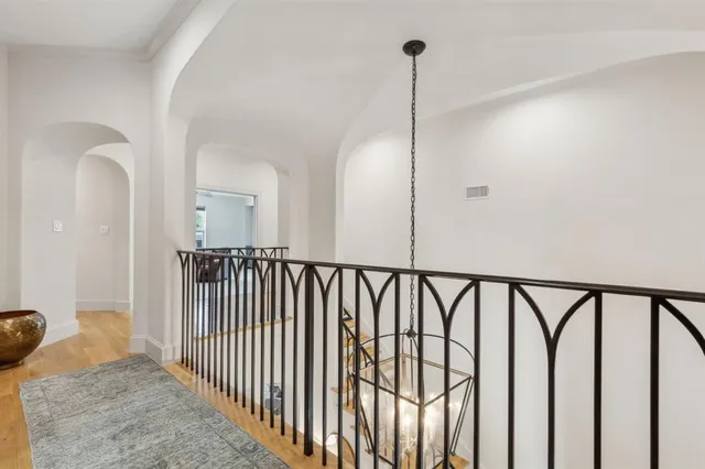 a bedroom with bed and window