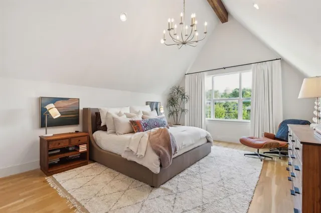 a spacious bathroom with double sink and a mirror