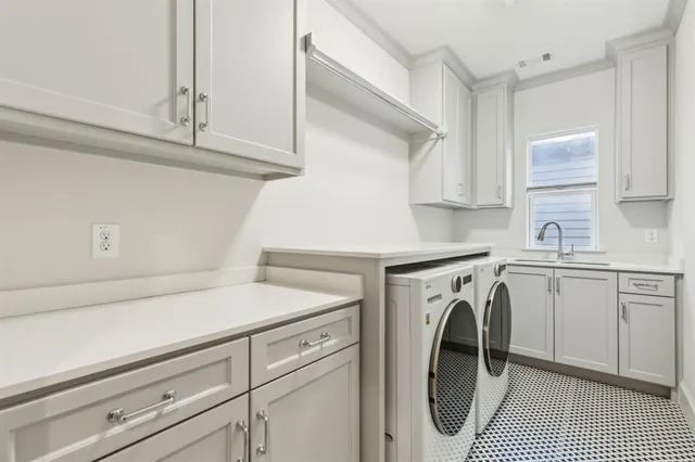 a outdoor space with patio the couches and a fireplace with the potted plants