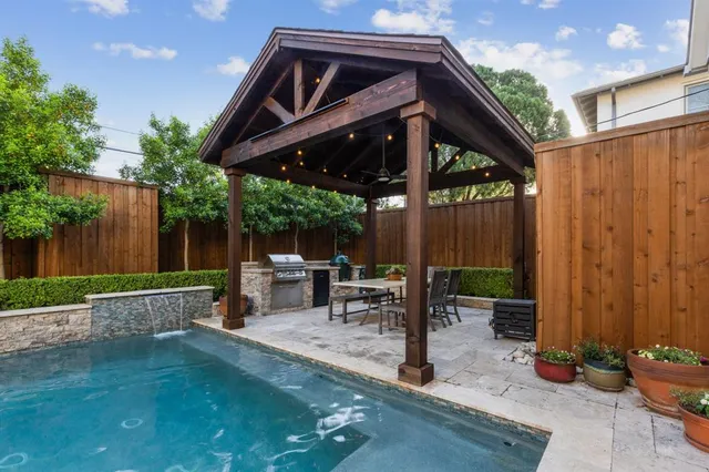 a patio with table and chairs