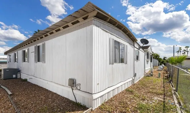 a group of people sitting in a living room