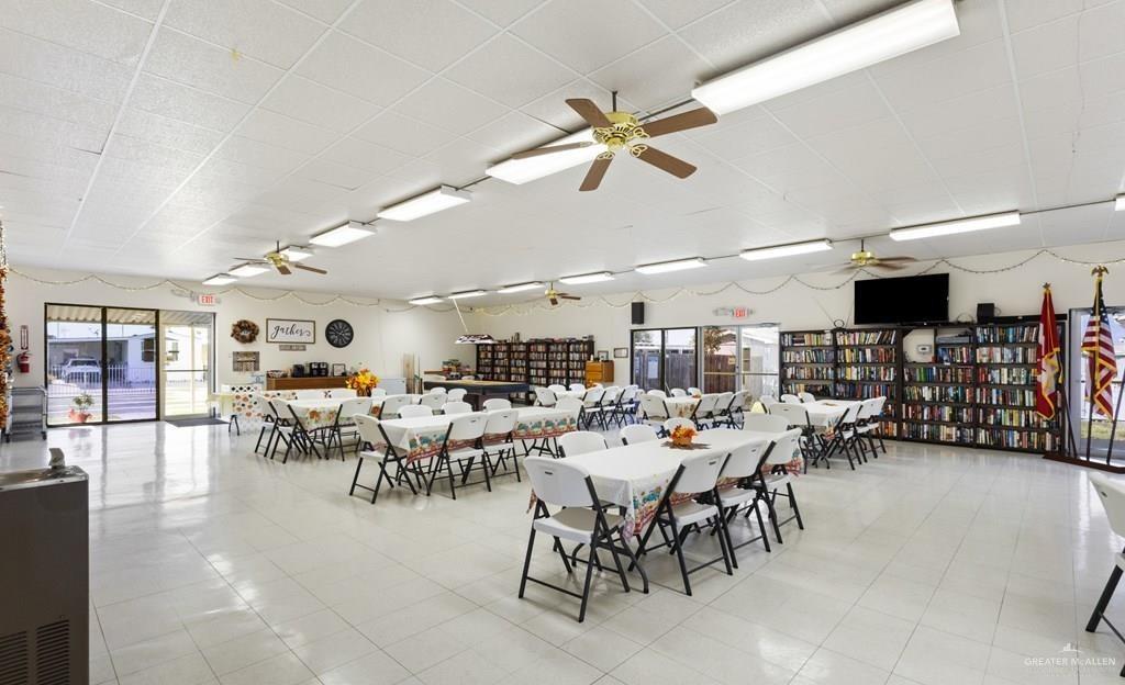 128 Apache Drive Harlingen, TX 78552 - Photo 15 of 17 a group of people sitting in a living room