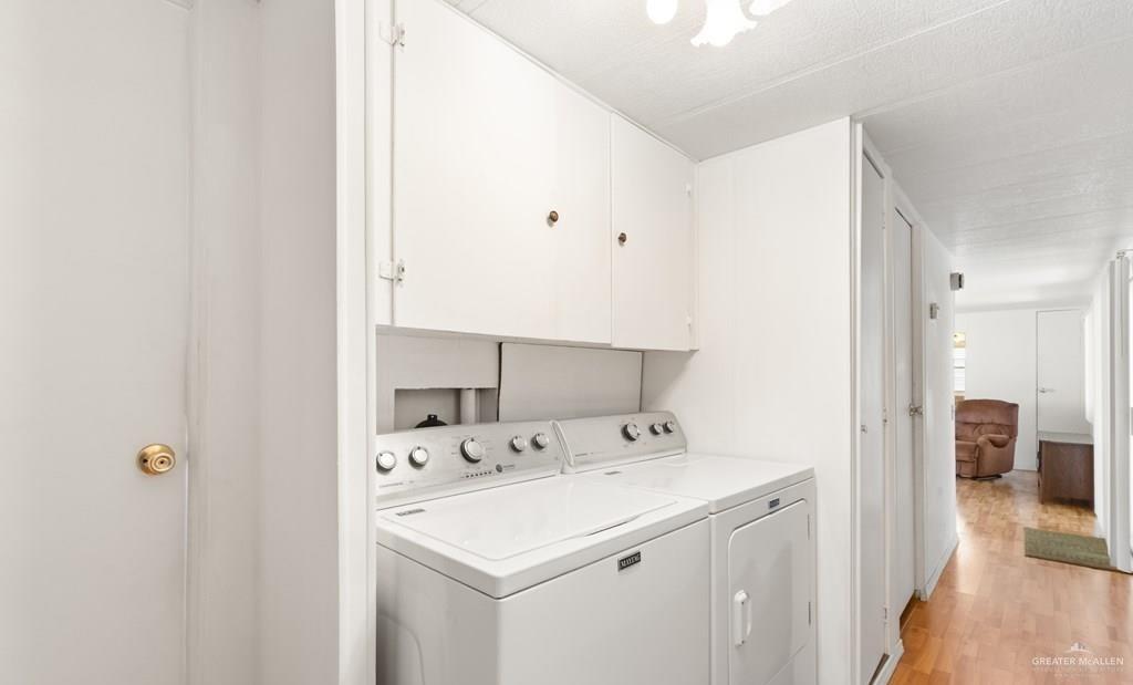 128 Apache Drive Harlingen, TX 78552 - Photo 7 of 17 a view of utility room with washer and dryer