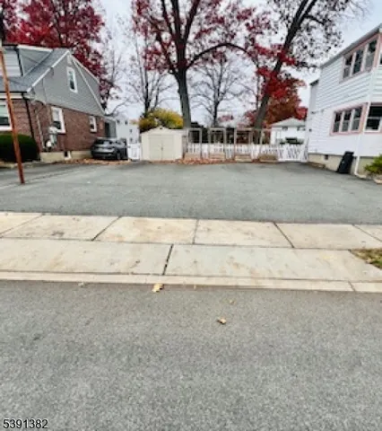 a view of a street with houses