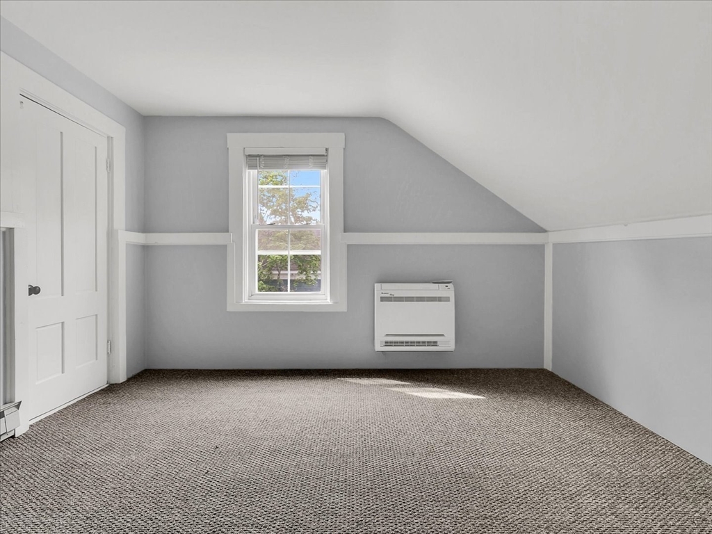 186 Main Street, Unit 2 Wayland, MA 01778 - Photo 36 of 41 an empty room with a window