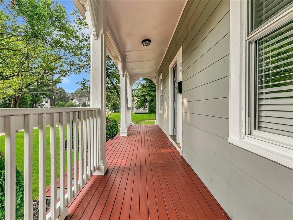 186 Main Street, Unit 2 Wayland, MA 01778 - Photo 10 of 41 a view of balcony with wooden floor