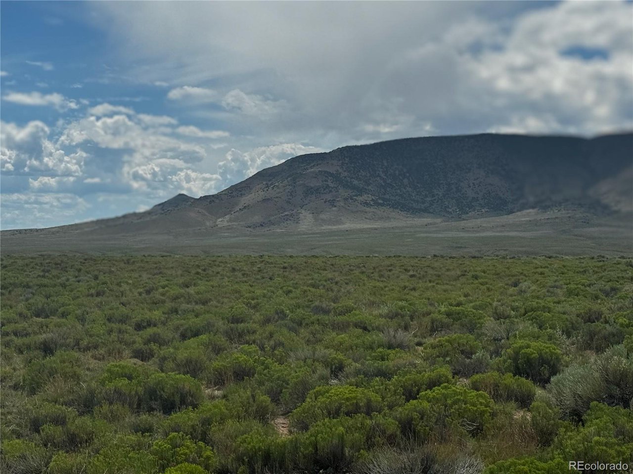 16 Harold Road San Luis, CO 81152 - Photo 13 of 15 a view of an outdoor space and mountains