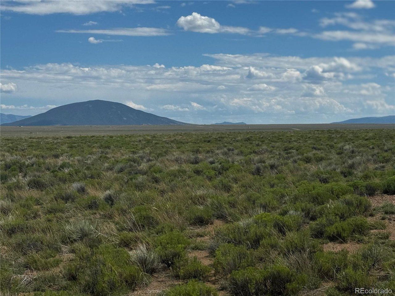 16 Harold Road San Luis, CO 81152 - Photo 2 of 15 a view of an outdoor space and mountain view