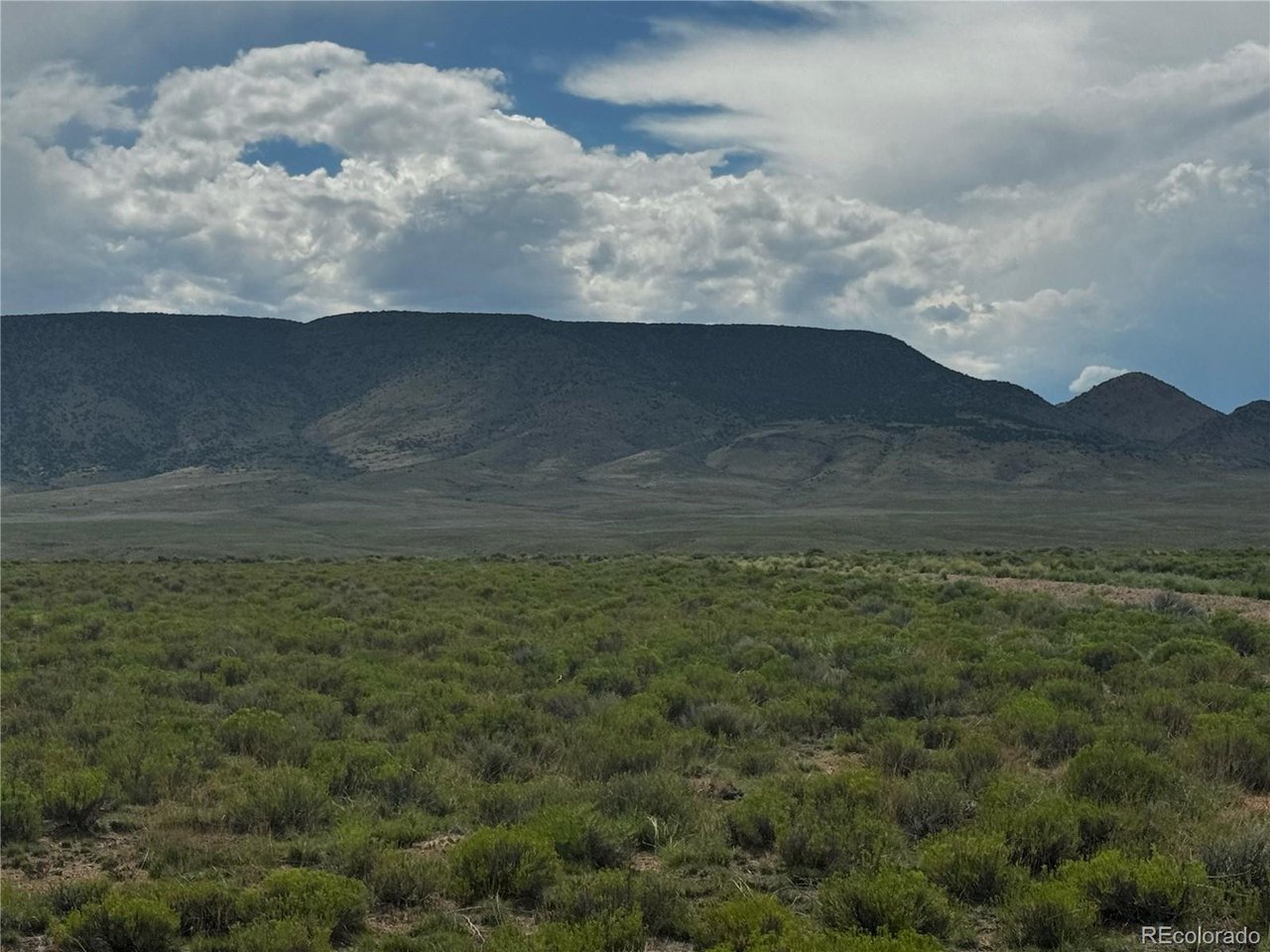 16 Harold Road San Luis, CO 81152 - Photo 8 of 15 a view of outdoor space and mountain view