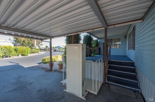 a view of a backyard with pathway