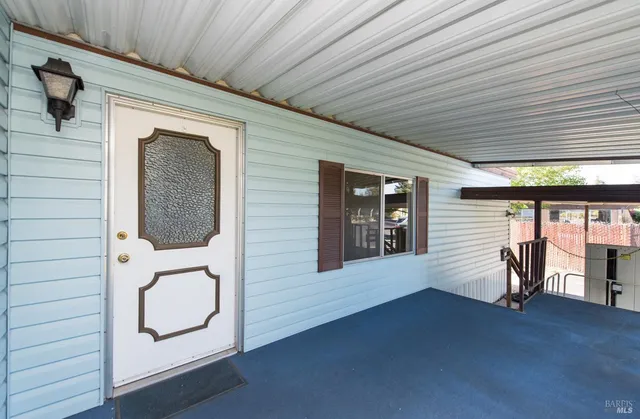 a front view of a house with wooden floor