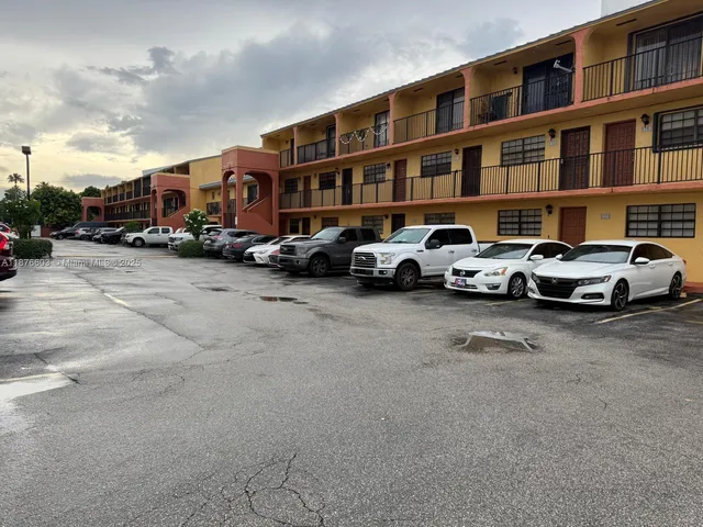 a car parked in front of a building