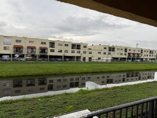 a view of building with yard