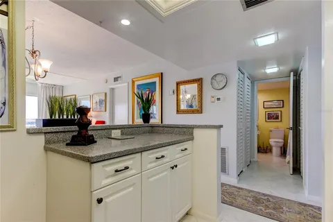 a view of living room with granite countertop furniture and a window