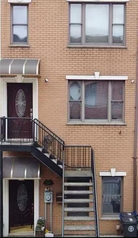 232 12th Street Brooklyn, NY 11215 - Photo 1 of 15 a front view of a house with stairs