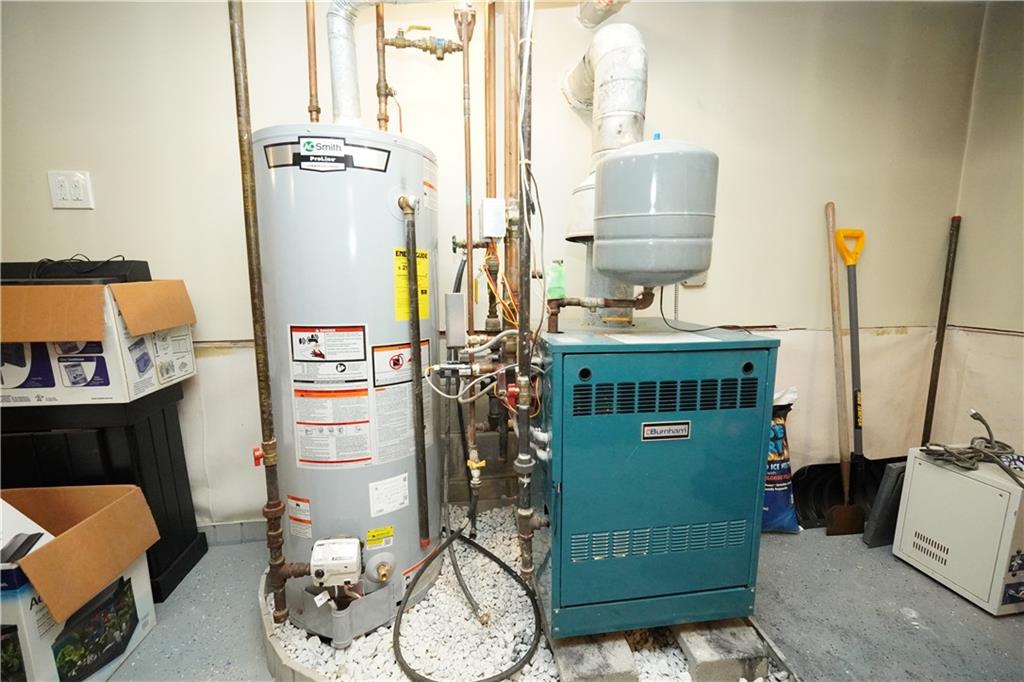 232 12th Street Brooklyn, NY 11215 - Photo 14 of 15 a view of living room with furniture and a fireplace