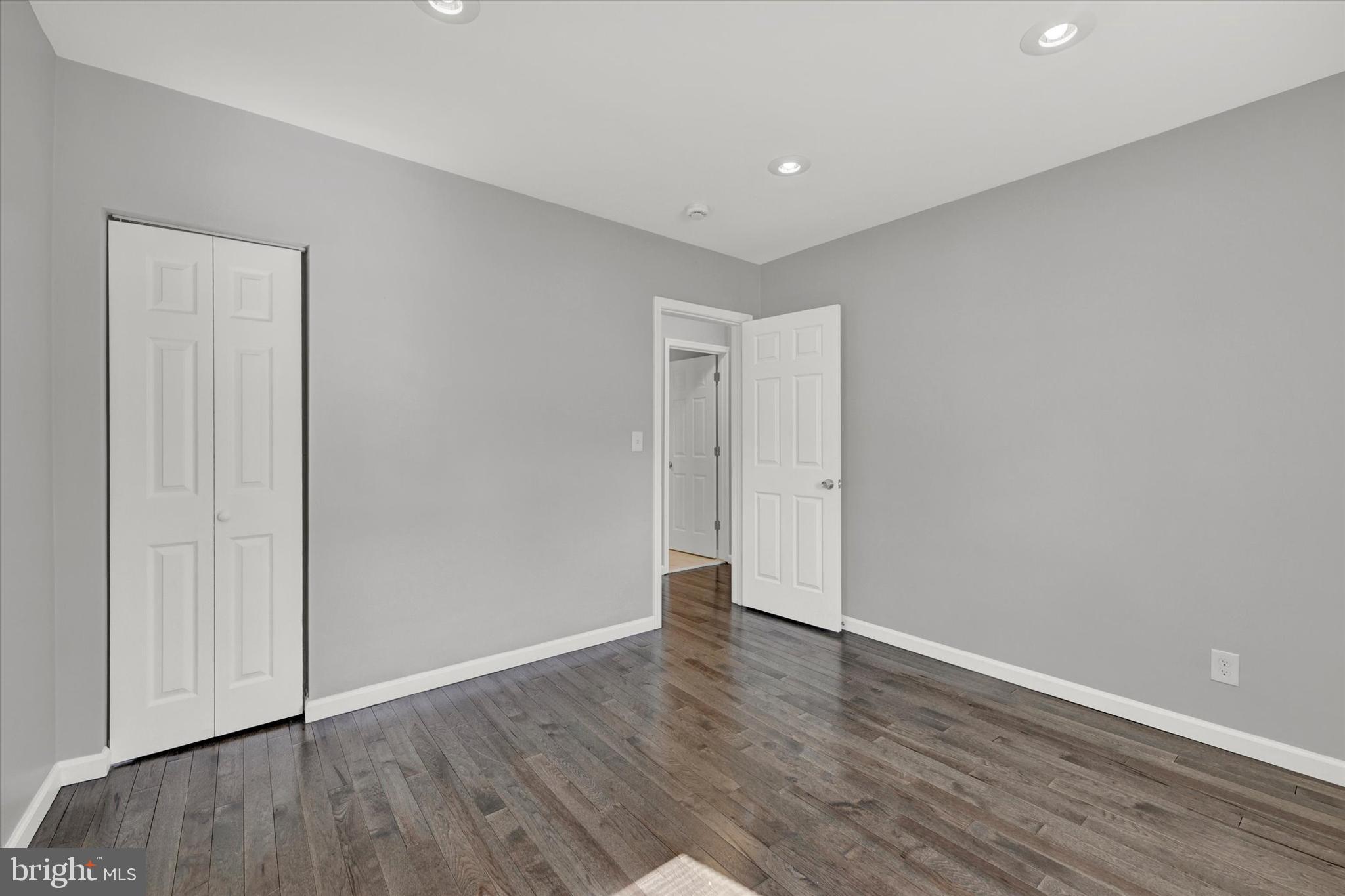 4604 Ridge Road Baltimore, MD 21236 - Photo 15 of 30 a view of an empty room with wooden floor