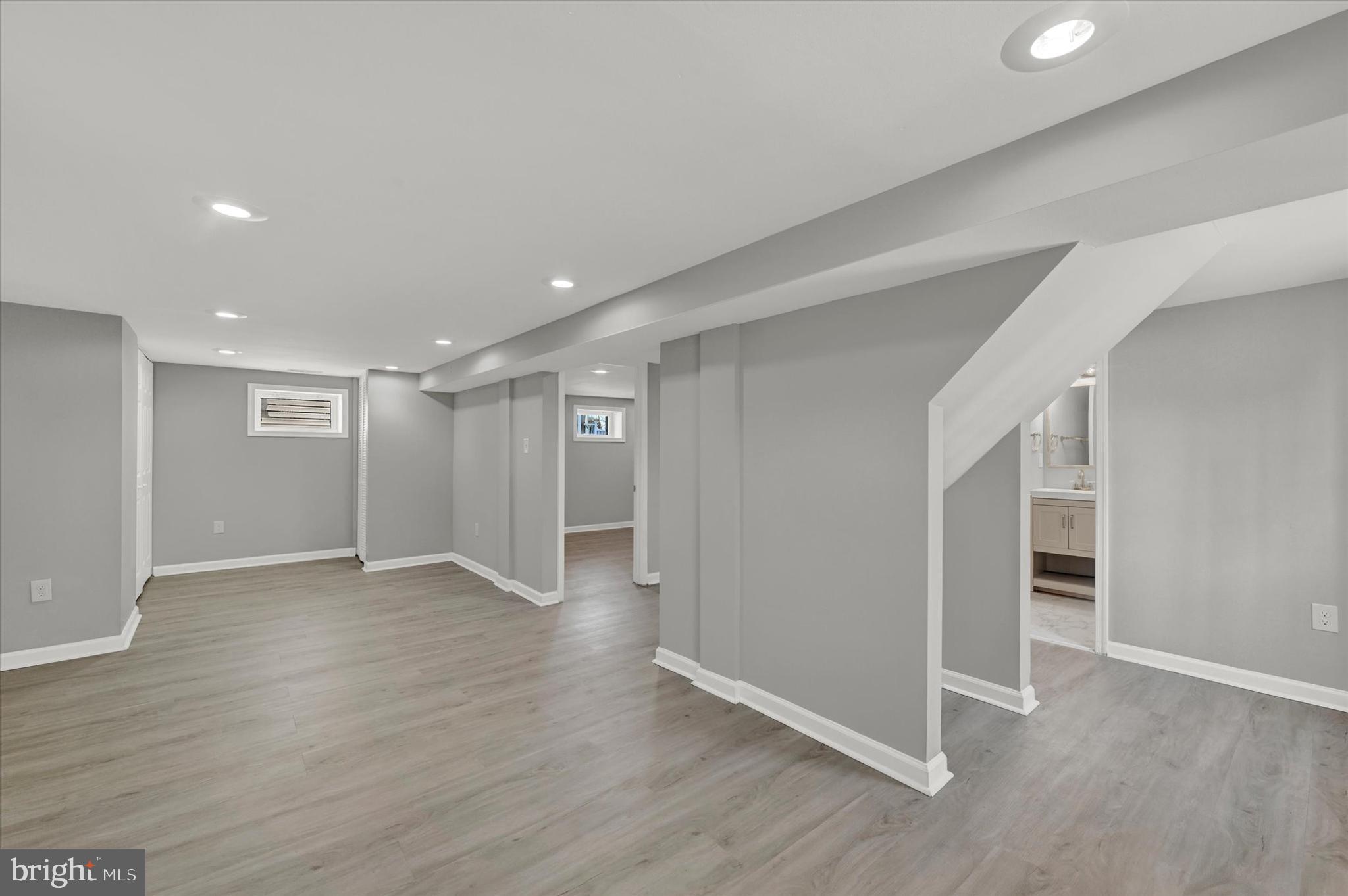 4604 Ridge Road Baltimore, MD 21236 - Photo 23 of 30 a view of an empty room with wooden floor