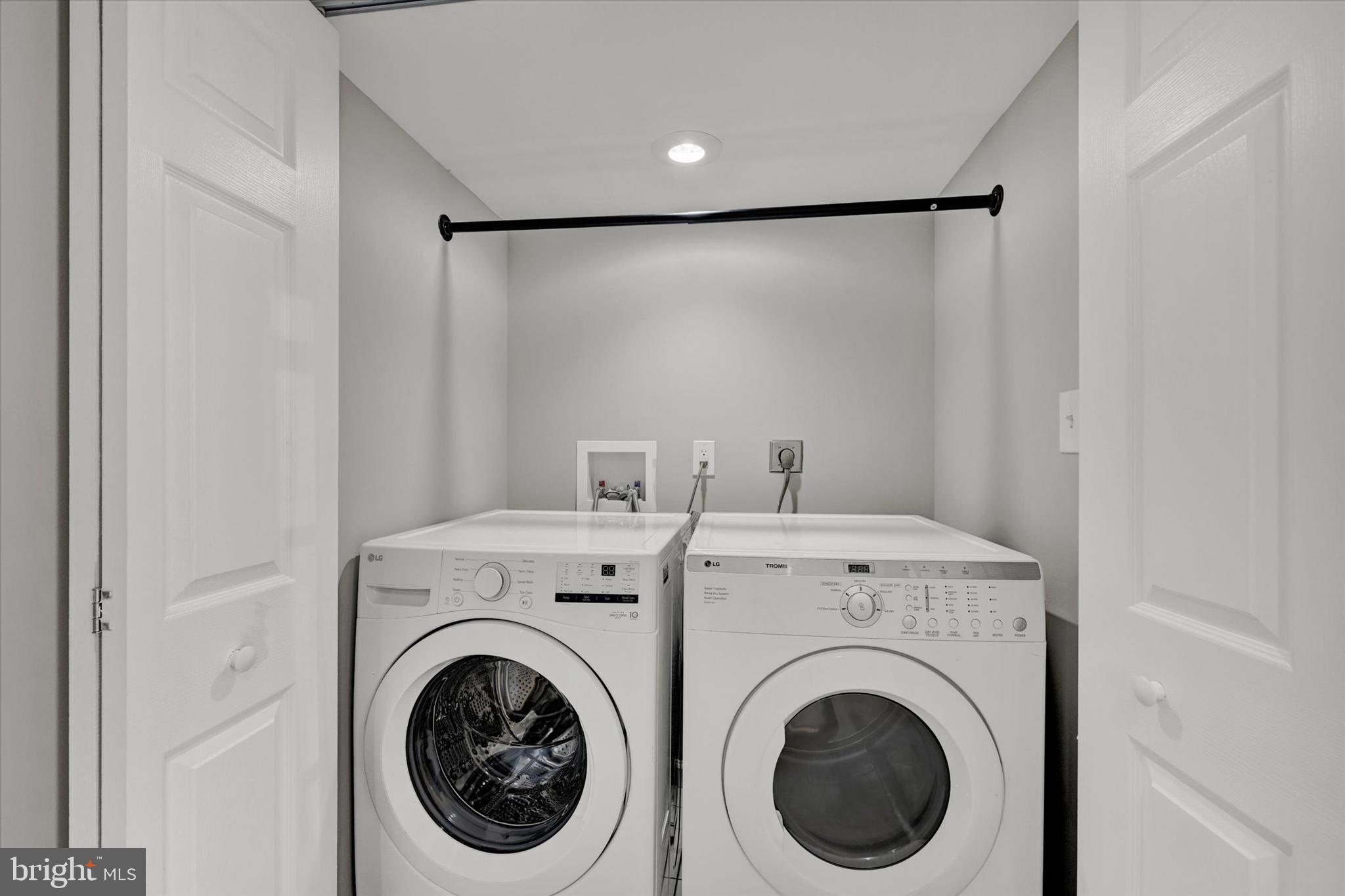4604 Ridge Road Baltimore, MD 21236 - Photo 25 of 30 a view of a storage & utility room with dryer and washer