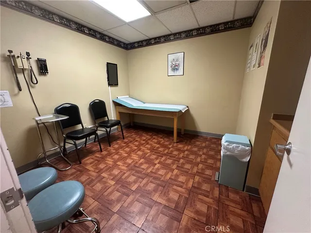 a room with furniture and air hockey table