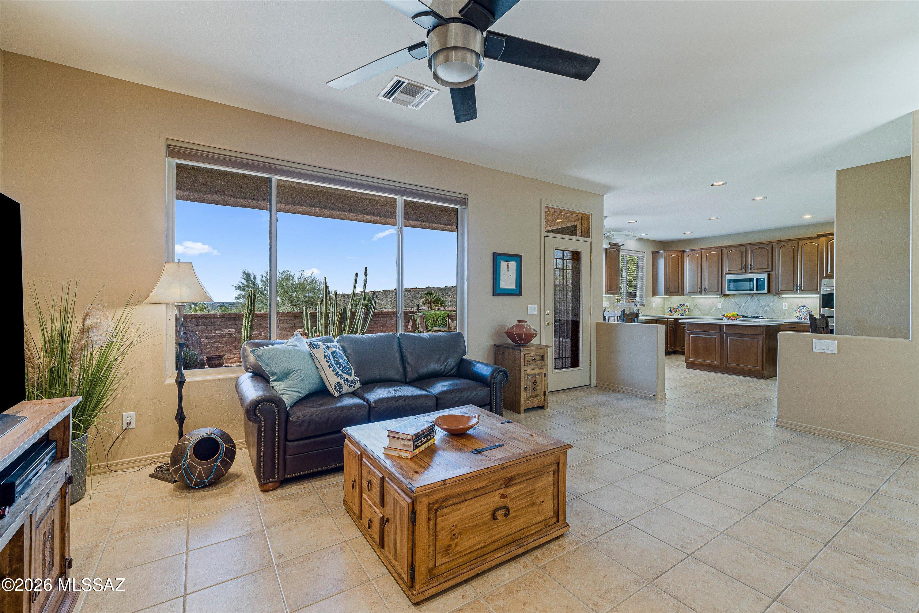 7452 East Ridge Point Road Tucson, AZ 85750 - Photo 17 of 42 Family Room to Kitchen