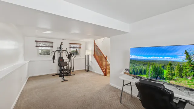 a view of a room with gym equipment