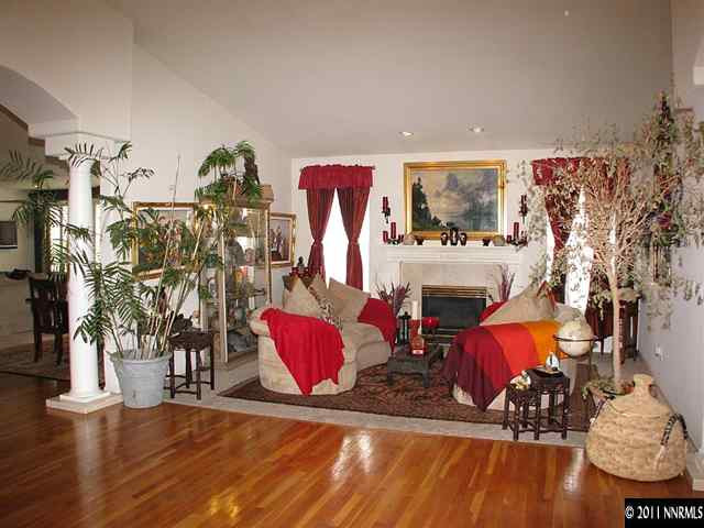 105 Gazelle Road Reno, NV 89511 - Photo 5 of 13 a living room with lots of furniture and a chandelier