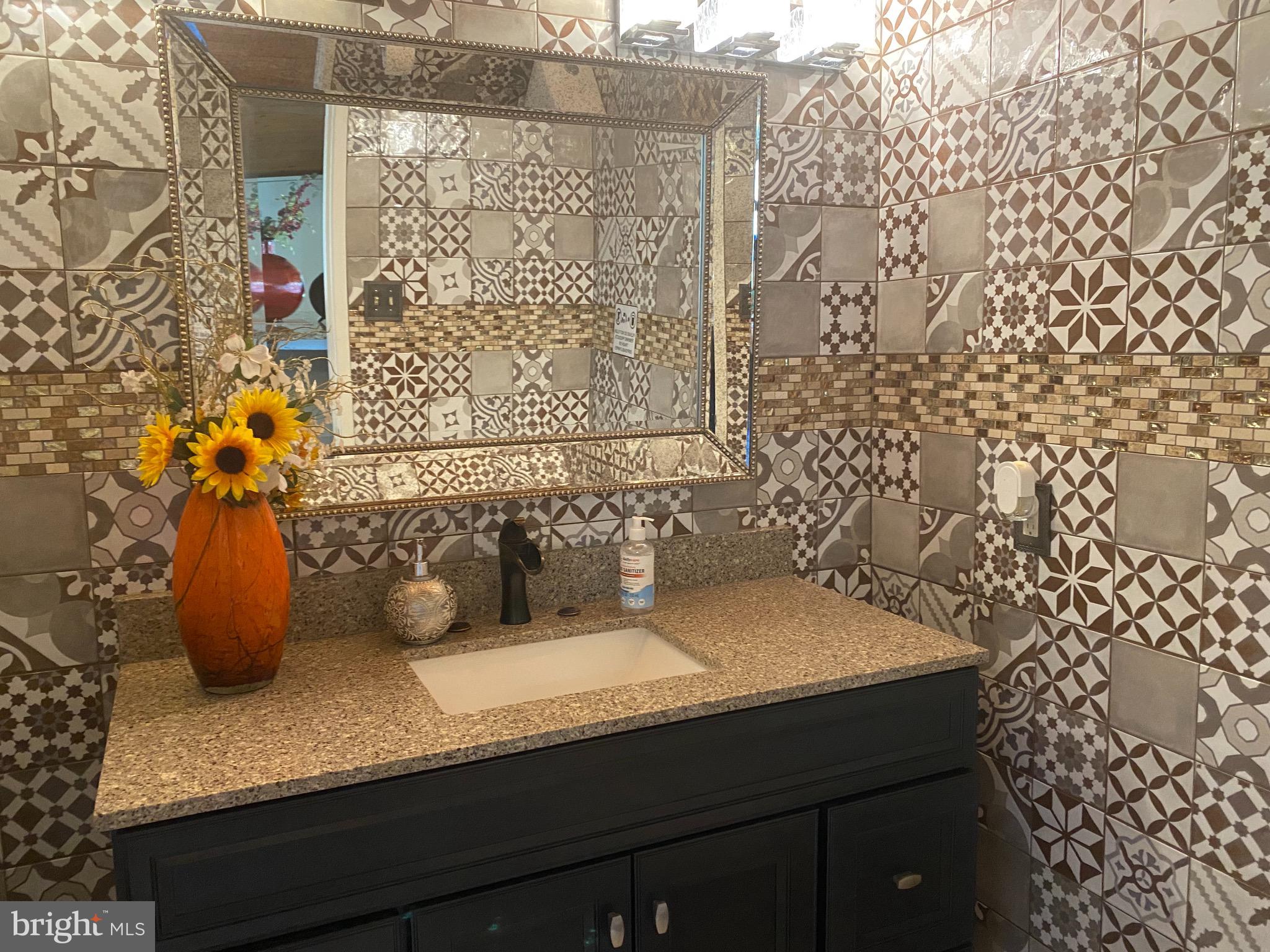 1731 Briggs Chaney Road Silver Spring, MD 20905 - Photo 35 of 76 Main Level Half Bath