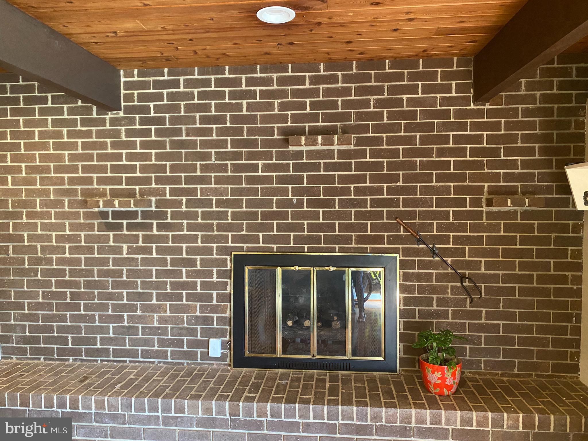 1731 Briggs Chaney Road Silver Spring, MD 20905 - Photo 59 of 76 Lower Level Fireplace