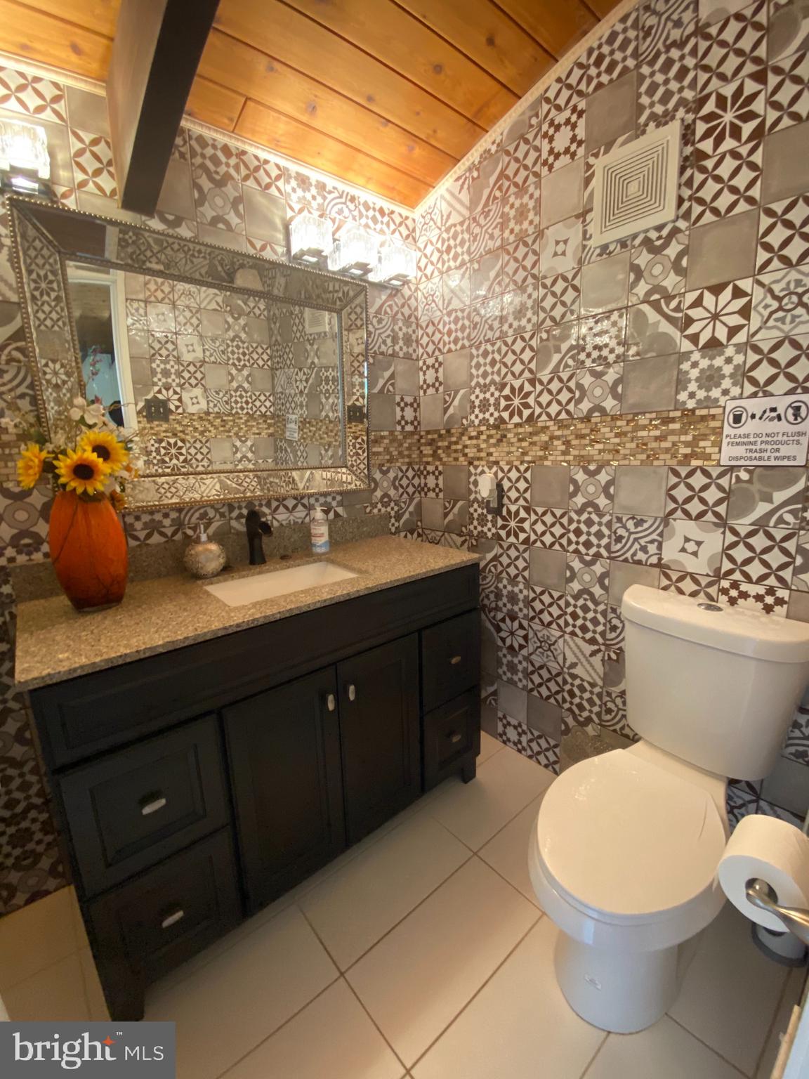 1731 Briggs Chaney Road Silver Spring, MD 20905 - Photo 9 of 76 Main Level Half Bath