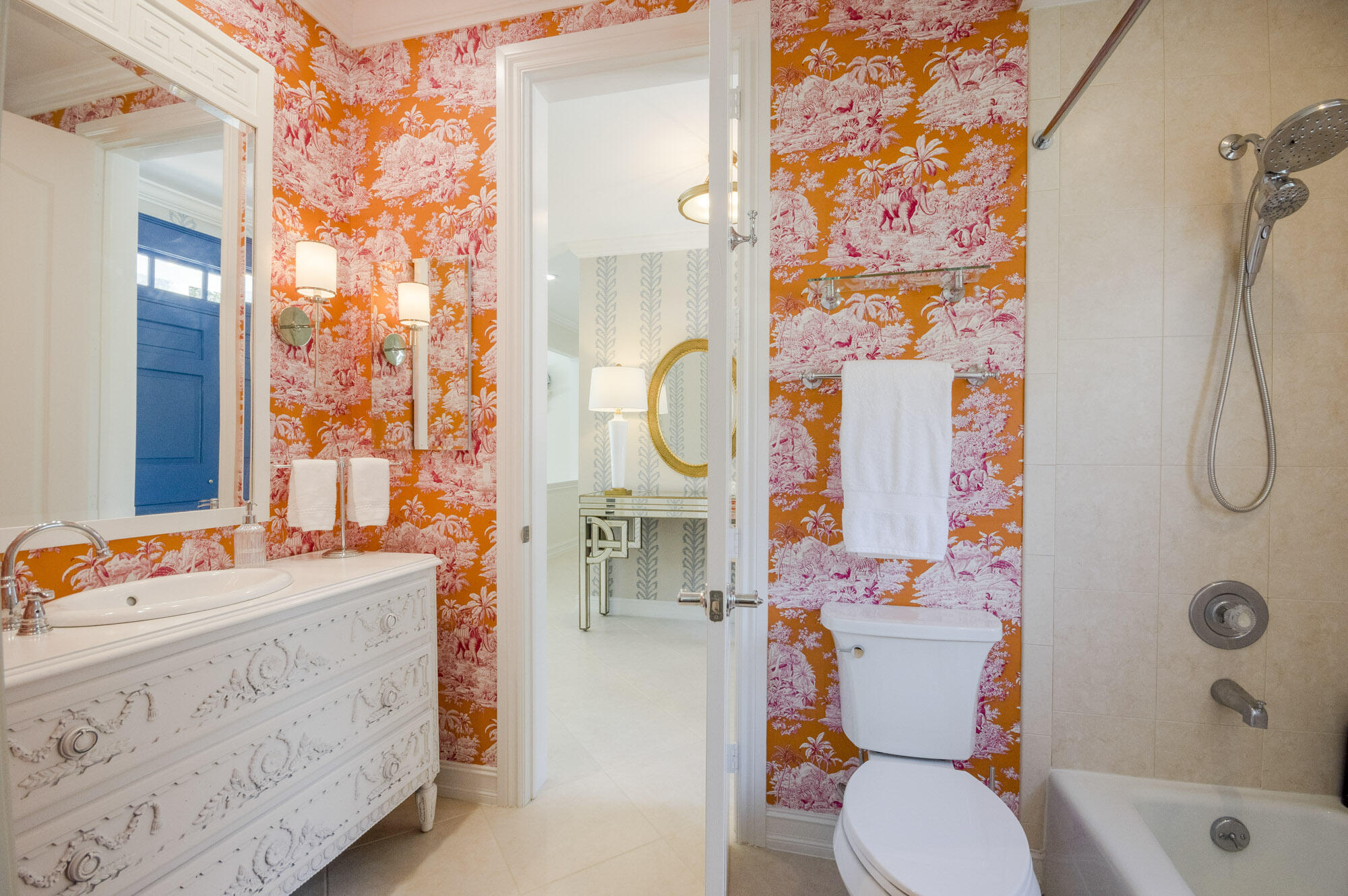 10182 Southeast Acorn Way Jupiter, FL 33469 - Photo 23 of 38 a bathroom with a sink a toilet and shower curtain