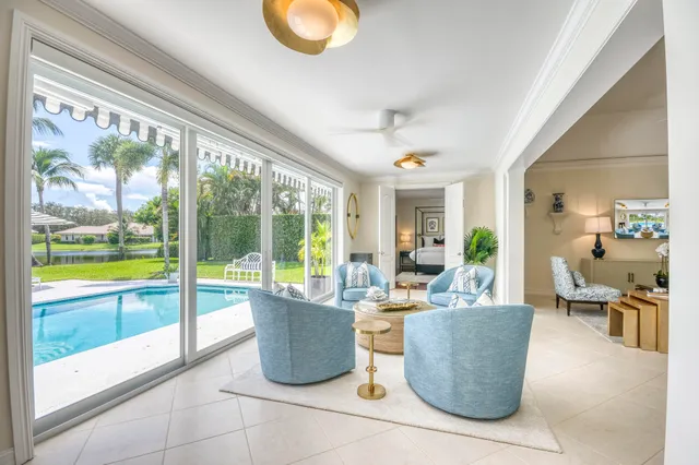 a living room with couches and coffee table