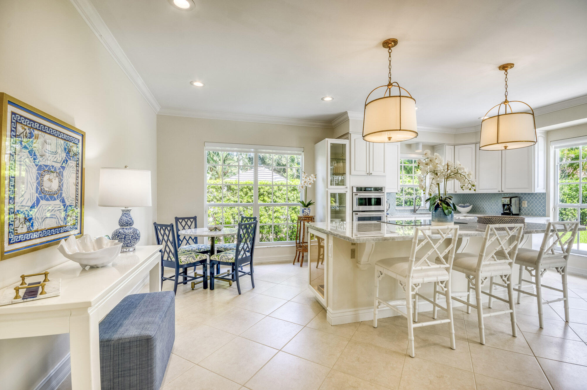 10182 Southeast Acorn Way Jupiter, FL 33469 - Photo 8 of 38 a view of a dining room with furniture window and outside view