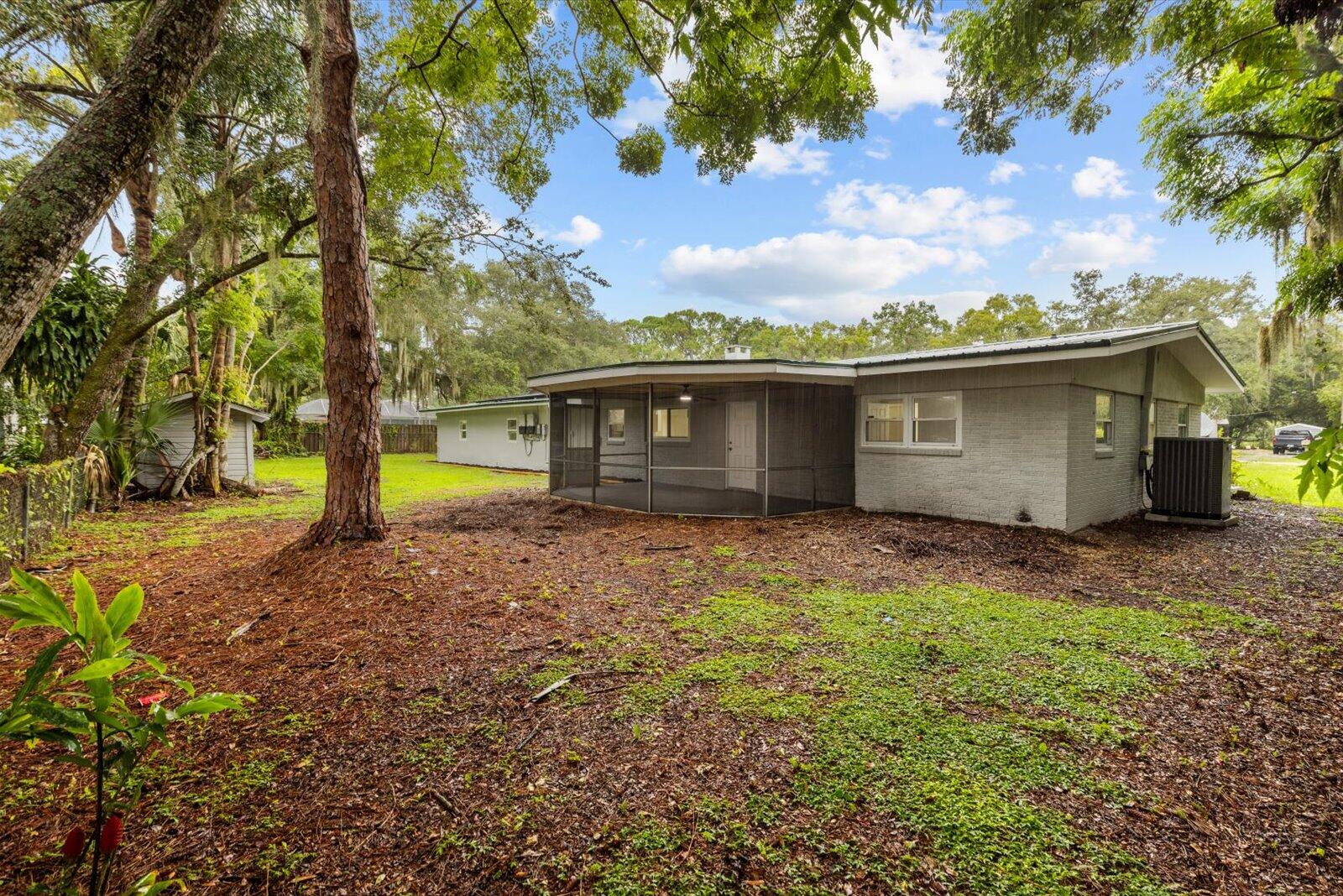 603 Southwest 14th Street Okeechobee, FL 34974 - Photo 34 of 41 a view of house with outdoor space and garden