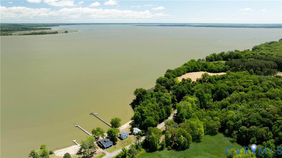 933 Pleasant Point Road Surry, VA 23883 - Photo 38 of 45 a view of a lake with a houses