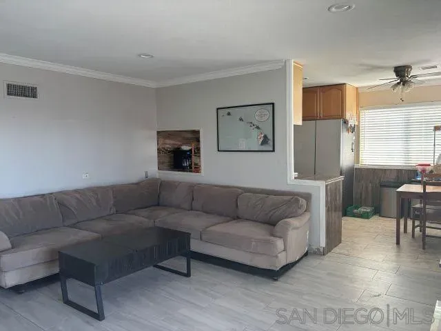 a living room with furniture and a couch
